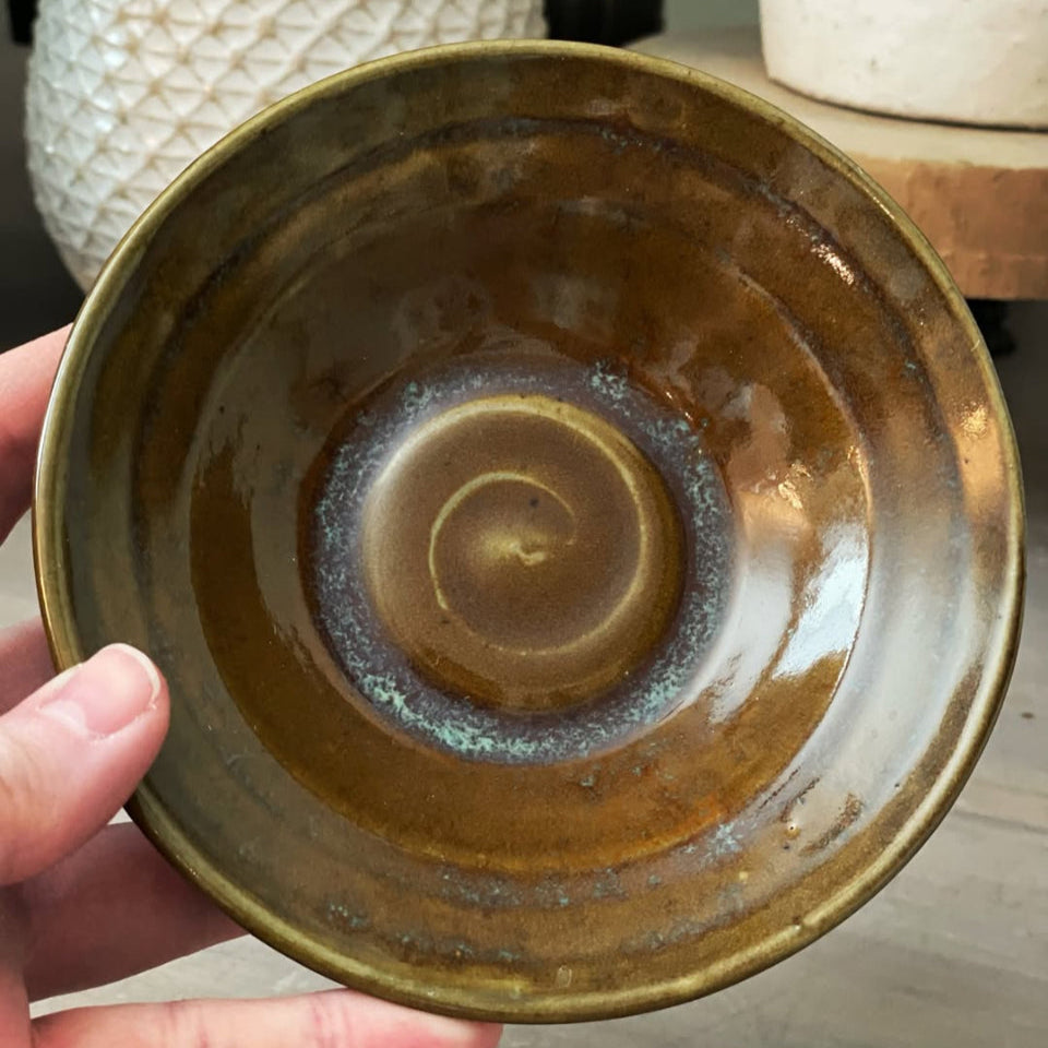 Stoneware bowl with spiral bottom and organic shape