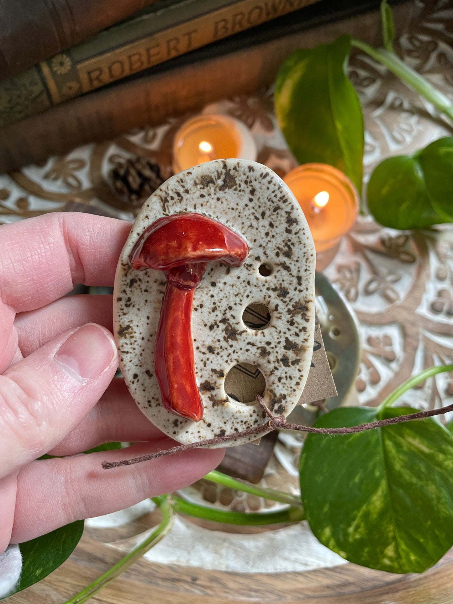 Artisan kitchen tool for stripping herbs, featuring whimsical mushroom details