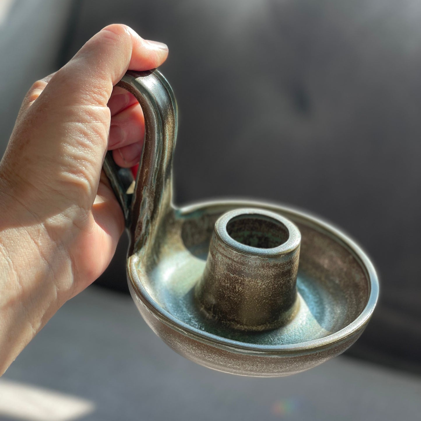 brown and green candlestick holder