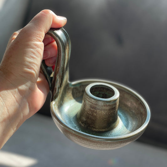 brown and green candlestick holder